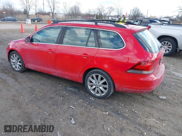 2012 Volkswagen Jetta SportWagen TDI with VIN 3VWPL7AJ0CM684682, listed as a IAAI auction lot 41680632 with 124,721 mi miles. Bid and sale history available at carsss.com. Image 3.