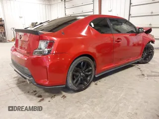 2016 Scion tC with VIN JTKJF5C71GJ025933, listed as a IAAI auction lot 41829097 with 89,728 mi miles. Bid and sale history available at carsss.com. Image 4.