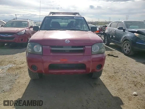 2003 Nissan Frontier XE with VIN 1N6ED27T13C409632, listed as a Copart auction lot 84884434 with 194,167 mi miles and Salvage title. Bid and sale history available at DreamBid. Image 11.
