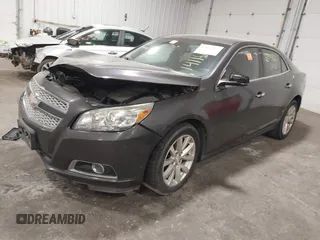 2013 Chevrolet Malibu LTZ with VIN 1G11H5SA1DF281933, listed as a IAAI auction lot 42114395 with 193,550 mi miles and . Bid and sale history available at DreamBid. Image 2.