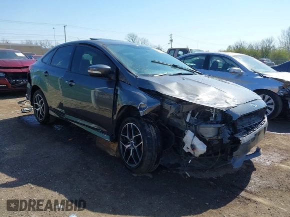 2015 Ford Focus SE with VIN 1FADP3F29FL268677, listed as a IAAI auction lot 42037244 with 118,018 mi miles. Bid and sale history available at carsss.com. Image 1.