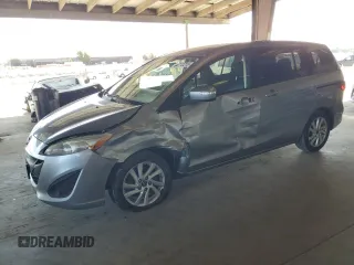 2014 Mazda 5 Sport with VIN JM1CW2BL9E0163445, listed as a Copart auction lot 64772215 with 86,020 mi miles and Salvage title. Bid and sale history available at DreamBid. Image 1.