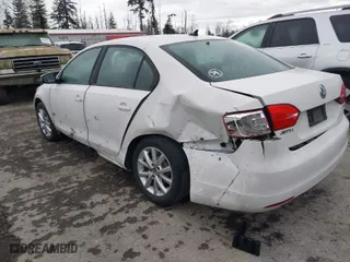 2011 Volkswagen Jetta Sedan SE PZEV with VIN 3VWDZ7AJ2BM311496, listed as a IAAI auction lot 41722414 with 84957 miles. Bid and sale history available at carsss.com. Image 3.