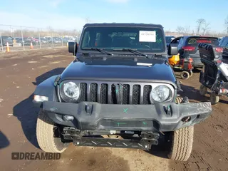 2018 Jeep Wrangler Unlimited Sport S with VIN 1C4HJXDN0JW255003, listed as a IAAI auction lot 41528394 with 55,660 mi miles and . Bid and sale history available at DreamBid. Image 13.