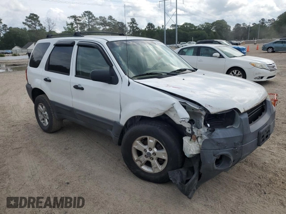 2006 Ford Escape XLT with VIN 1FMYU03146KC34615, listed as a Copart auction lot 55096195 with 144,398 mi miles and Salvage Title. Bid and sale history available at DreamBid. Image 4.