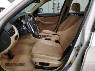 2014 BMW X1 xDrive28i with VIN WBAVL1C57EVY14339, listed as a Copart auction lot 42933495 with 121,026 mi miles and Salvage Title. Bid and sale history available at carsss.com. Image 7.