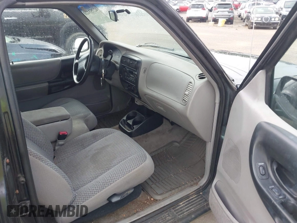 1998 Ford Ranger XL z VIN 1FTYR14U3WTA55366, wystawiony jako IAAI lot #42753120 z przebiegiem 119 629 mil mil oraz . Historia ofert i sprzedaży dostępna na DreamBid. Obrazek 5.