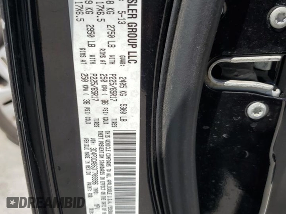 2013 Dodge Journey American Value with VIN 3C4PDCAB6DT709996, listed as a Copart auction lot 52362635 with 104,808 mi miles and Salvage Title. Bid and sale history available at DreamBid. Image 15.