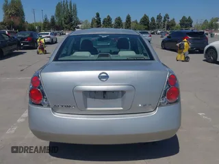 2006 Nissan Altima S with VIN 1N4AL11D56N405498, listed as a IAAI auction lot 42082567 with 228,463 mi miles and . Bid and sale history available at DreamBid. Image 16.