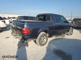 2001 Ford F-150 SuperCrew XLT with VIN 1FTRW07W41KE36887, listed as a Copart auction lot 76418694 with 280,470 mi miles and Salvage Title. Bid and sale history available at carsss.com. Image 3.