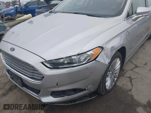 2016 Ford Fusion Energi SE Luxury with VIN 3FA6P0PU9GR357076, listed as a IAAI auction lot 42081615 with 174,234 mi miles. Bid and sale history available at carsss.com. Image 6.