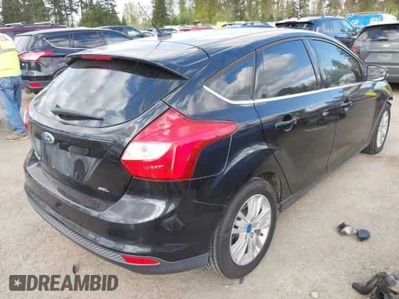 2012 Ford Focus SEL with VIN 1FAHP3M2XCL106248, listed as a IAAI auction lot 42088933 with 117,333 mi miles. Bid and sale history available at carsss.com. Image 4.