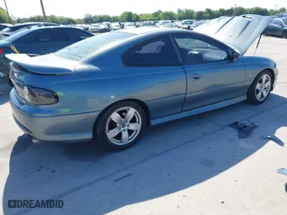 2006 Pontiac GTO with VIN 6G2VX12U66L811744, listed as a IAAI auction lot 41988486 with 81,893 mi miles. Bid and sale history available at carsss.com. Image 4.