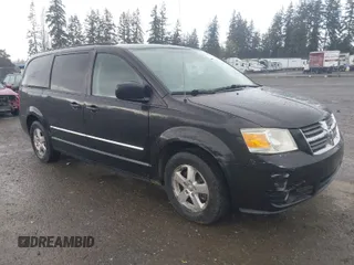 2009 Dodge Grand Caravan SXT with VIN 2D8HN54119R569142, listed as a IAAI auction lot 42000421 with 161,717 mi miles and . Bid and sale history available at DreamBid. Image 1.