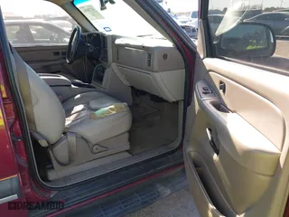 2004 Chevrolet Tahoe LT with VIN 1GNEC13ZX4R166600, listed as a IAAI auction lot 41728301 with 245,044 mi miles. Bid and sale history available at carsss.com. Image 5.