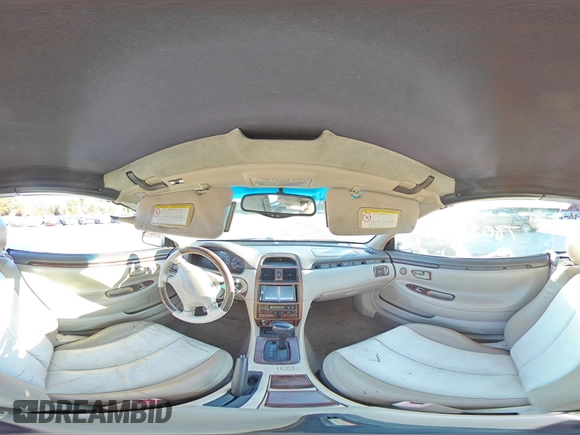 2001 Toyota Solara SE z VIN 2T1FF28P61C474810, wystawiony jako Copart lot #78028704 z przebiegiem 117 214 mil mil oraz Czysty tytuł • Clean title. Historia ofert i sprzedaży dostępna na DreamBid. Obrazek 13.