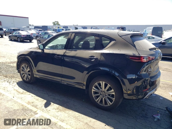 2024 Mazda CX-5 2.5 Turbo Signature with VIN JM3KFBXY4R0388868, listed as a Copart auction lot 73435824 with 5,540 mi miles and Salvage Title. Bid and sale history available at carsss.com. Image 2.