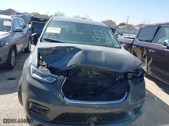 2023 Chrysler Pacifica Hybrid Touring L with VIN 2C4RC1L75PR599135, listed as a IAAI auction lot 39785830 with 28,781 mi miles. Bid and sale history available at carsss.com. Image 13.