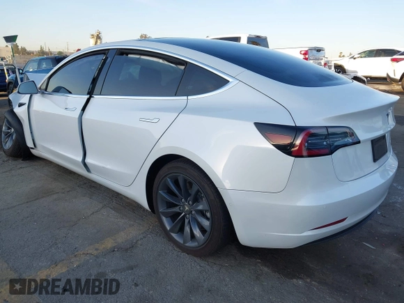 2020 Tesla Model 3 Performance with VIN 5YJ3E1EC1LF602516, listed as a IAAI auction lot 41841216 with 28,967 mi miles and . Bid and sale history available at DreamBid. Image 3.