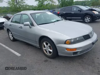 2002 Mitsubishi Diamante LS z VIN 6MMAP57P82T020388, wystawiony jako IAAI lot #42185015 z przebiegiem 121 463 mil mil oraz . Historia ofert i sprzedaży dostępna na DreamBid. Obrazek 1.