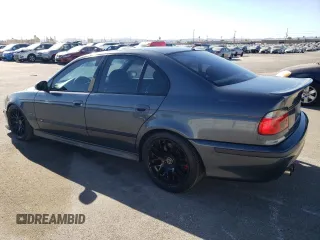 2000 BMW M5 z VIN WBSDE9349YBZ94615, wystawiony jako Copart lot #88802245 z przebiegiem 157 774 mil mil oraz Tytuł czysty. Historia ofert i sprzedaży dostępna na DreamBid. Obrazek 2.