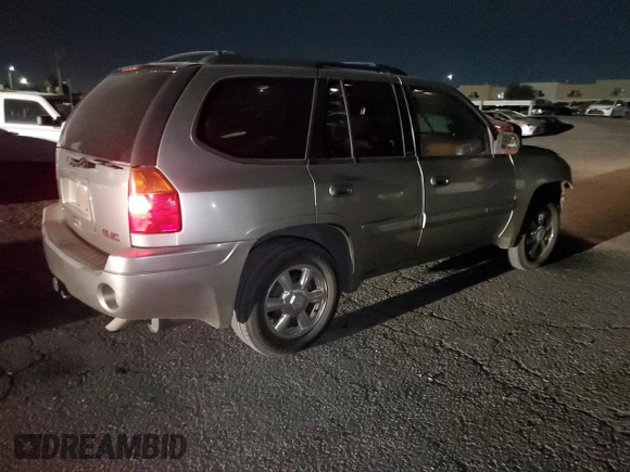2002 GMC Envoy SLT with VIN 1GKDT13S522286497, listed as a Copart auction lot 84501384 with 207,226 mi miles and Salvage Title. Bid and sale history available at carsss.com. Image 3.