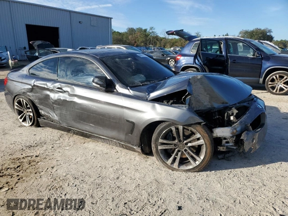 2015 BMW 4 Series 435i xDrive z VIN WBA3R5C56FK371987, wystawiony jako Copart lot #88077015 z przebiegiem Nie podano mil oraz Szkoda całkowita • Salvage title. Historia ofert i sprzedaży dostępna na DreamBid. Obrazek 4.