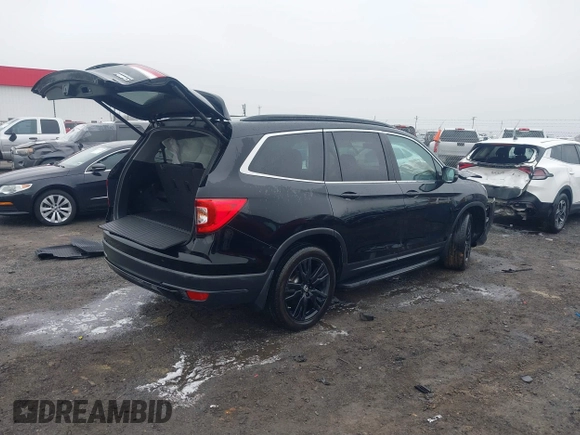 2021 Honda Pilot Special Edition with VIN 5FNYF6H29MB002461, listed as a IAAI auction lot 41501013 with 58,187 mi miles. Bid and sale history available at carsss.com. Image 4.