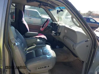 1999 Chevrolet Suburban with VIN 3GNEC16RXXG111175, listed as a IAAI auction lot 41193569 with 276,326 mi miles and . Bid and sale history available at DreamBid. Image 5.