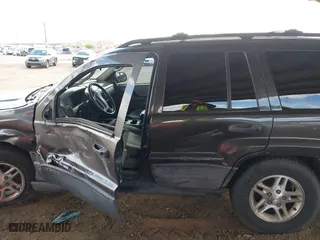 2004 Jeep Grand Cherokee Laredo with VIN 1J4GX48N64C436853, listed as a IAAI auction lot 41785918 with 118,578 mi miles. Bid and sale history available at carsss.com. Image 13.