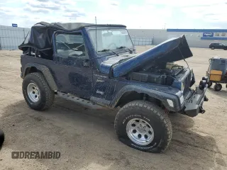 2002 Jeep Wrangler Sport z VIN 1J4FA49SX2P772609, wystawiony jako Copart lot #55893425 z przebiegiem 157 653 mil mil oraz Szkoda całkowita • Salvage title. Historia ofert i sprzedaży dostępna na DreamBid. Obrazek 4.