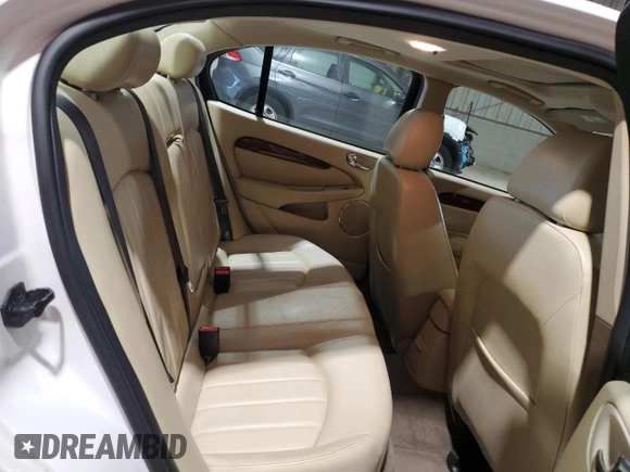 2004 Jaguar X-Type with VIN SAJEA51C34WE06046, listed as a Copart auction lot 56982105 with 69,265 mi miles and Clean Title. Bid and sale history available at DreamBid. Image 10.