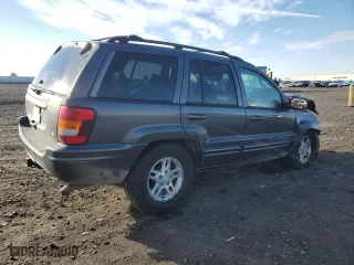 2003 Jeep Grand Cherokee Limited with VIN 1J8GW58N73C502929, listed as a Copart auction lot 79472734 with 231,176 mi miles and Salvage Title. Bid and sale history available at carsss.com. Image 3.