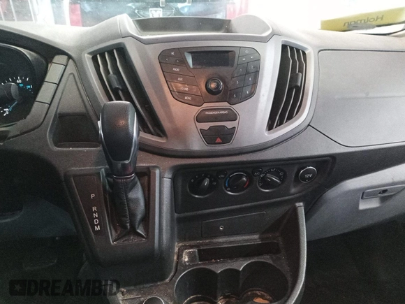 2018 Ford Transit with VIN 1FTYE1CM4JKB47646, listed as a IAAI auction lot 42728009 with 207,268 mi miles and . Bid and sale history available at DreamBid. Image 11.