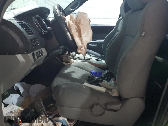 2012 Toyota Tacoma with VIN 3TMLU4EN7CM097146, listed as a Copart auction lot 57894665 with Not provided miles and Salvage title. Bid and sale history available at DreamBid. Image 7.