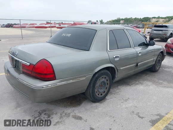 2003 Mercury Grand Marquis GS Convenience z VIN 2MEFM74W83X678151, wystawiony jako IAAI lot #42393410 z przebiegiem 273 966 mil mil oraz . Historia ofert i sprzedaży dostępna na DreamBid. Obrazek 4.