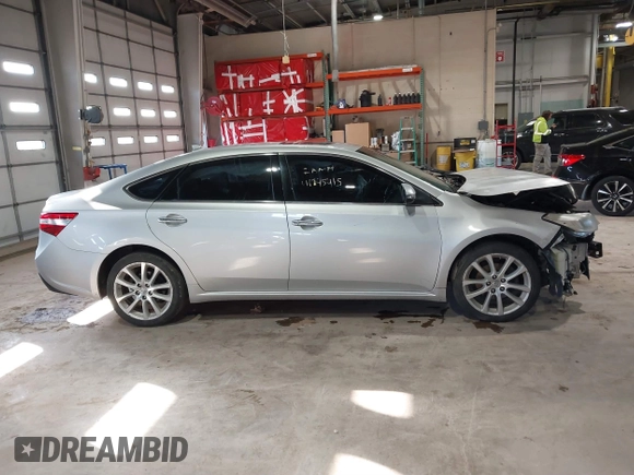 2013 Toyota Avalon XLE with VIN 4T1BK1EB0DU058025, listed as a IAAI auction lot 41845415 with 173,359 mi miles and . Bid and sale history available at DreamBid. Image 14.