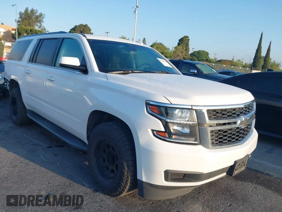 2018 Chevrolet Suburban LS with VIN 1GNSKGKC5JR173889, listed as a IAAI auction lot 42152865 with 73,358 mi miles and . Bid and sale history available at DreamBid. Image 1.
