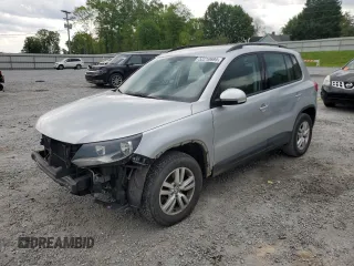 2017 Volkswagen Tiguan S with VIN WVGAV7AX9HK002092, listed as a Copart auction lot 52210695 with 113,791 mi miles and Salvage Title. Bid and sale history available at DreamBid. Image 1.