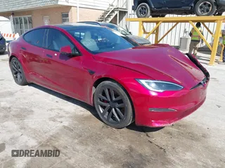 2023 Tesla Model S Plaid with VIN 5YJSA1E61PF525637, listed as a IAAI auction lot 42045459 with Not provided miles and . Bid and sale history available at DreamBid. Image 1.