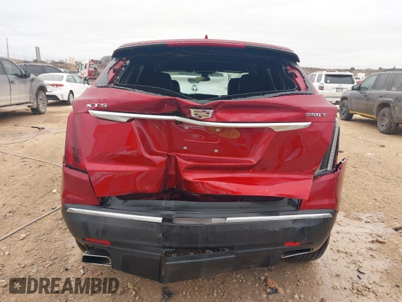 2023 Cadillac XT5 FWD Luxury z VIN 1GYKNAR42PZ147121, wystawiony jako IAAI lot #41315848 z przebiegiem 10 444 mil mil oraz . Historia ofert i sprzedaży dostępna na DreamBid. Obrazek 16.