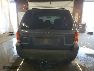 2006 Ford Escape XLS with VIN 1FMYU92Z56KA23659, listed as a Copart auction lot 76896374 with 0 mi miles and Salvage Title. Bid and sale history available at carsss.com. Image 6.