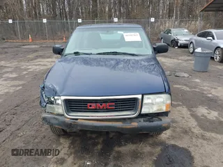 2003 GMC Sonoma SLS with VIN 1GTCS14H138228849, listed as a IAAI auction lot 41541363 with 217,969 mi miles. Bid and sale history available at carsss.com. Image 12.