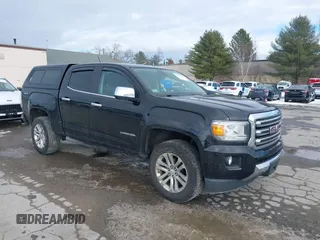 2015 GMC Canyon 4WD SLT with VIN 1GTG6CE39F1238269, listed as a IAAI auction lot 41327897 with 155,663 mi miles. Bid and sale history available at carsss.com. Image 1.