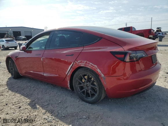 2021 Tesla Model 3 Long Range with VIN 5YJ3E1EB4MF035663, listed as a Copart auction lot 50725345 with 77,140 mi miles and Salvage Title. Bid and sale history available at carsss.com. Image 2.