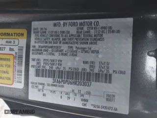 2017 Ford Fusion Energi SE with VIN 3FA6P0PU6HR203037, listed as a IAAI auction lot 41567334 with 96,852 mi miles. Bid and sale history available at carsss.com. Image 9.