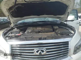 2013 Infiniti QX56 z VIN JN8AZ2NCXD9330307, wystawiony jako IAAI lot #41721153 z przebiegiem 160 769 mil mil oraz . Historia ofert i sprzedaży dostępna na DreamBid. Obrazek 10.