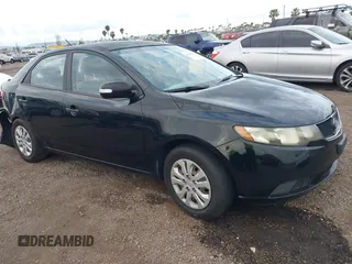 2010 Kia Forte EX with VIN KNAFU4A28A5050734, listed as a IAAI auction lot 42063165 with 179,284 mi miles. Bid and sale history available at carsss.com. Image 1.