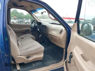1998 Ford F-150 with VIN 1FTZF1725WNB76296, listed as a IAAI auction lot 42278511 with 223,324 mi miles and . Bid and sale history available at DreamBid. Image 5.