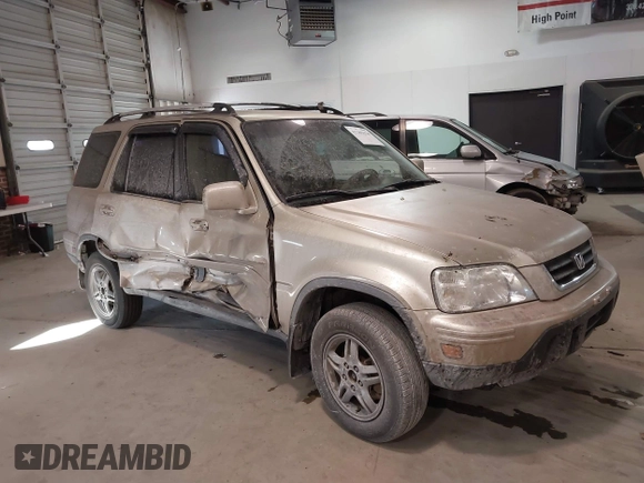 2000 Honda CR-V SE with VIN JHLRD1879YC037127, listed as a IAAI auction lot 41285624 with 246,170 mi miles. Bid and sale history available at carsss.com. Image 1.